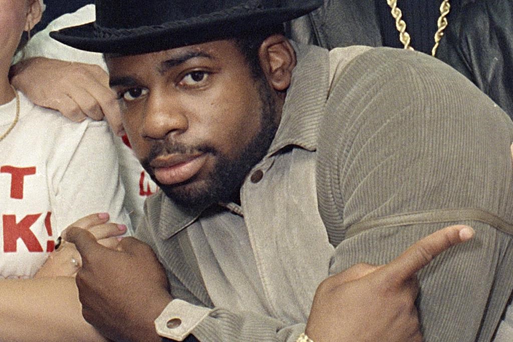 FILE -Run-D.M.C.'s Jason Mizell, Jam-Master Jay, poses with teenagers gathered at New York's Madison Square Garden, Oct. 7, 1986, in New York. Two men were convicted of murder Tuesday, Feb. 27, 2024 in the death of Run-DMC star Jam Master Jay, a brazen 2002 shooting in the rap legend's studio. An anonymous Brooklyn federal jury delivered the verdict in the trial of Karl Jordan Jr. and Ronald Washington.(AP Photo/G. Paul Burnett, File).