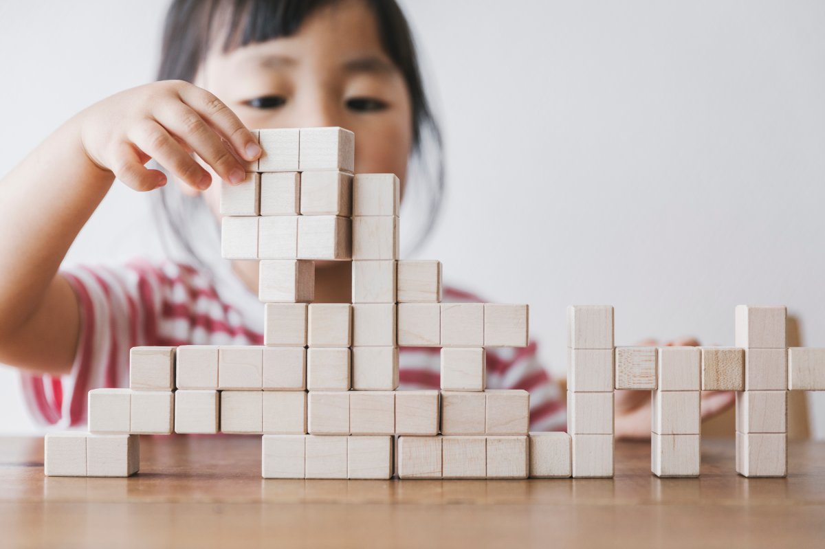 Child working on puzzle